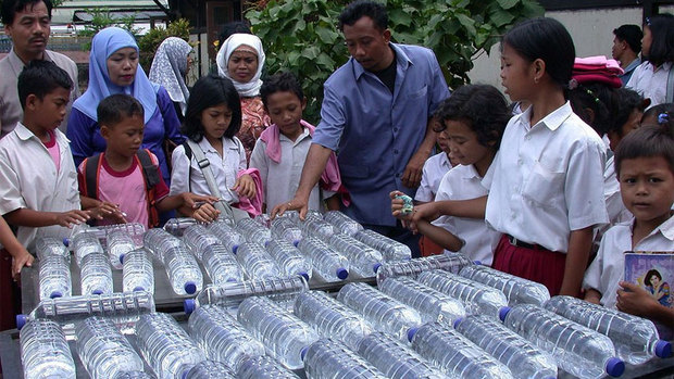 people doing uv solar water treatment sterilization
